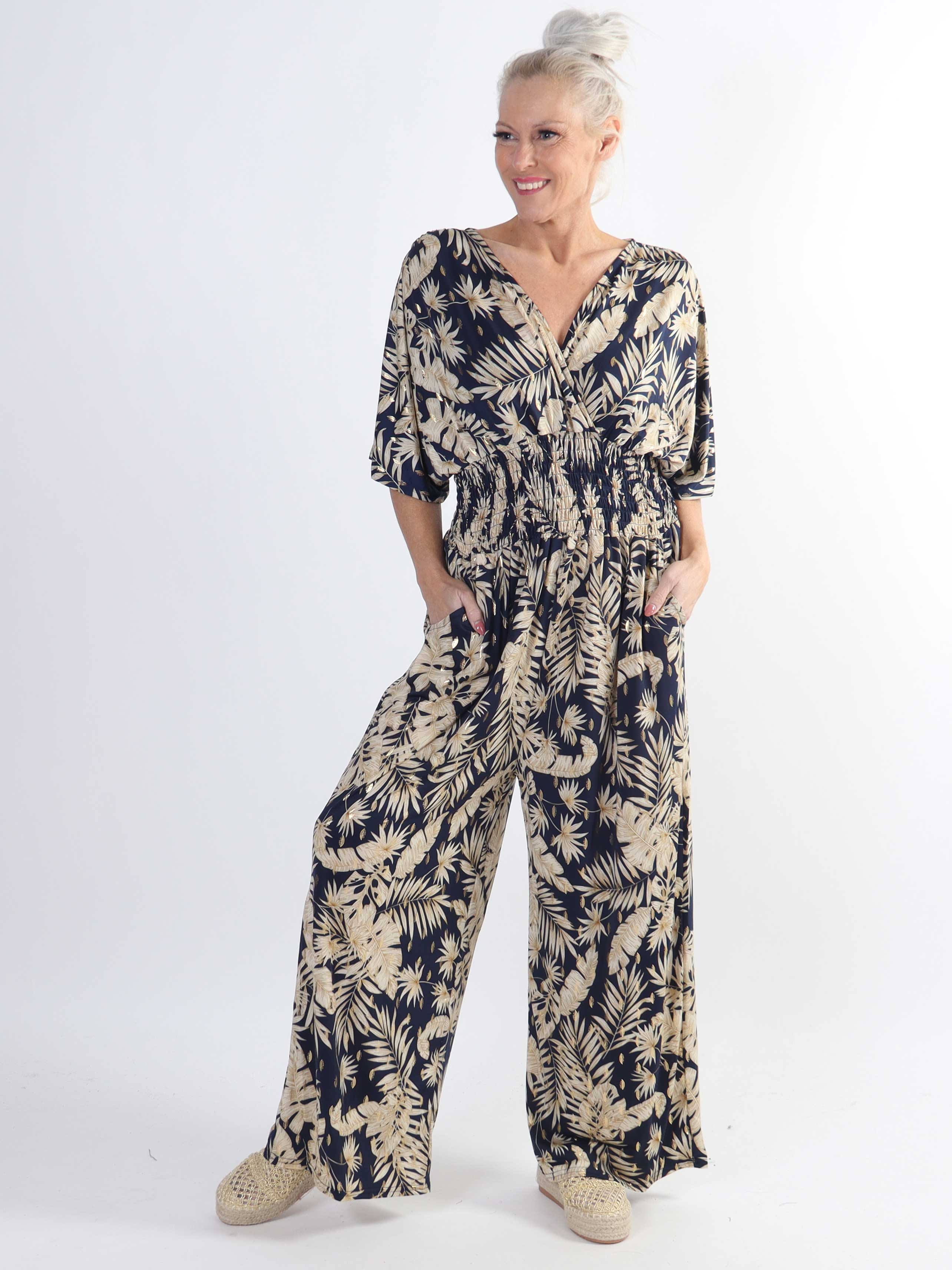 Pams Gold Leaf Jumpsuit - Jumpsuit med resår och bladmönster i stora storlekar